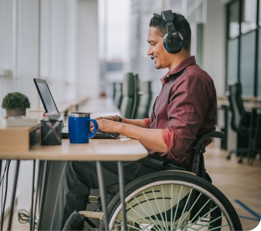 disabled man operating laptop